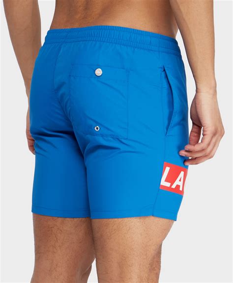 Lyst Lacoste Branded Swim Shorts In Blue For Men