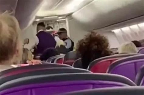 Passengers Tackle Naked Man Charging Cockpit As Plane Is Forced To Turn Around Daily Star