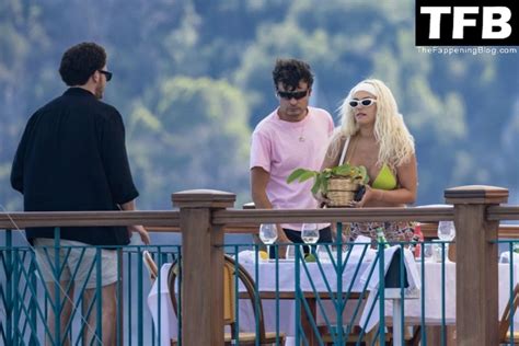Kelsey Calemine Rocks A Yellow Bikini Aboard A Yacht On A Summer Break In Nerano Photos