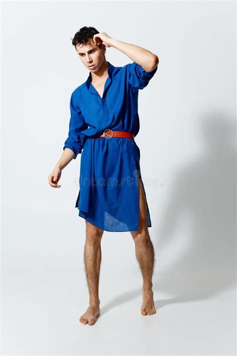 Gay Man In A Blue Dress With A Red Belt Spread His Legs Stock Photo Image Of Business Fashion