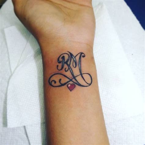 small tattoo ideas   simple  cool initial tattoo