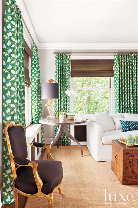 Master bedroom with green curtains - Luxe Interiors + Design