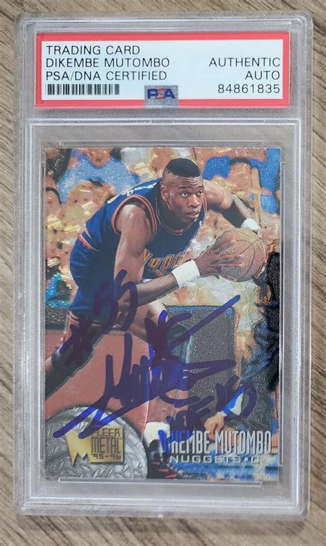 Dikembe Mutombo Signed 1995 96 Fleer Metal Card 25 NBA HOF Slabbed