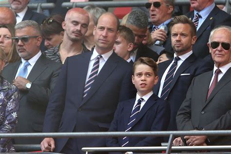 Prince George delights fans and joins Prince William in royal box at FA