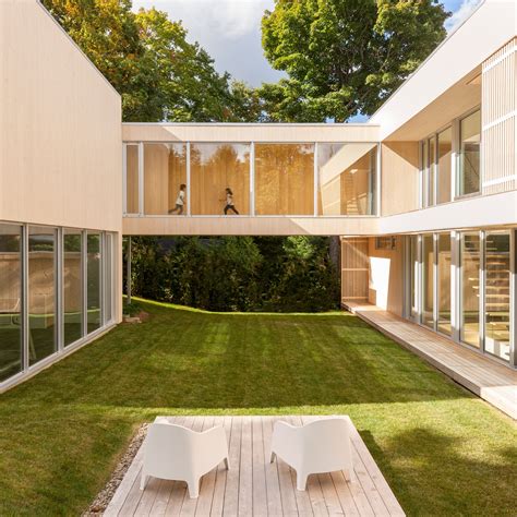 Waterfront Home By Atelier Pierre Thibault Overlooks Quebecs Lac Masson