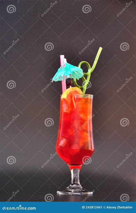 Sex On The Beach Refreshing Beach Cocktail With Ice And Straws In A Tall Glass On A Black