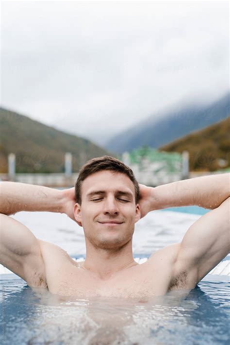 Relaxing Man In Hot Tub Outdoors By Stocksy Contributor Alina Hvostikova Stocksy