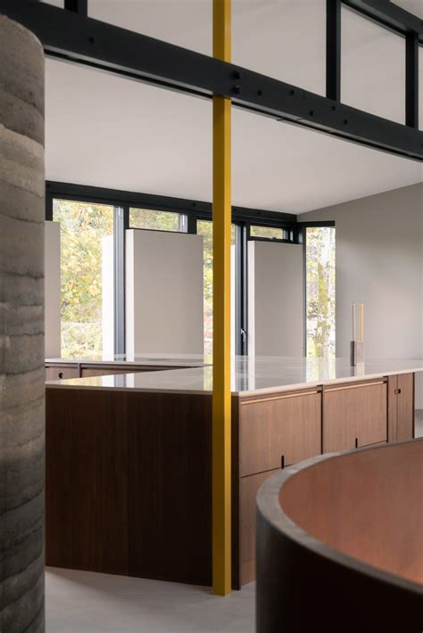 Curved Wall of Rammed Earth in Iceland Home