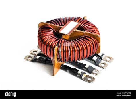 Transformer copper wire coil isolated on a white background Stock Photo - Alamy