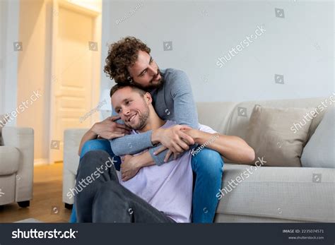 Lovely Gay Couple Kissing While Sitting Stock Photo Shutterstock
