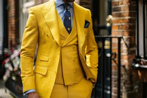 Premium Photo Fashionable Man In Elegant Yellow Suit