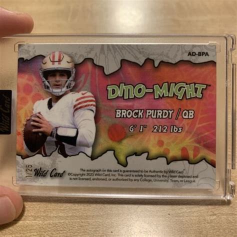 Wild Card Alumination Brock Purdy Dino Might Auto Autograph