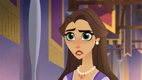 A Woman With Long Brown Hair And Green Eyes In A Purple Dress Is