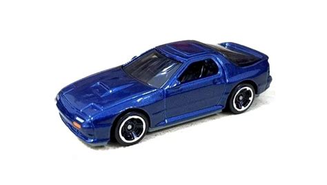 Машинка Базова Hot Wheels Mazda Savanna RX FC S J Imports GTC Dark Blue купити в