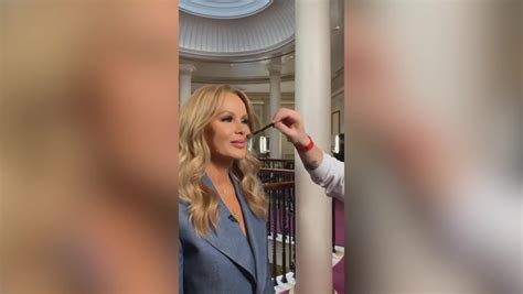 Amanda Holden, 52, strips nude in cheeky clip as she glams up ahead of