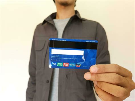 Man Showing Bca Debit Card 32063143 Stock Photo At Vecteezy