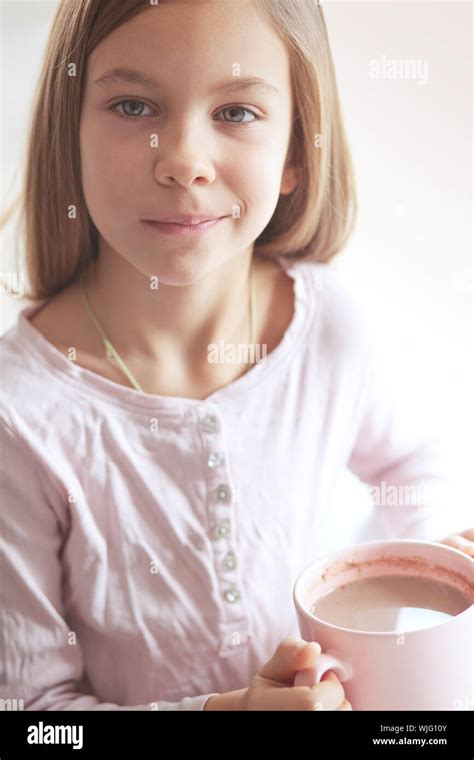 Years Old Girl Drinking Hot Cocoa From The Big Pink Cup Stock Photo