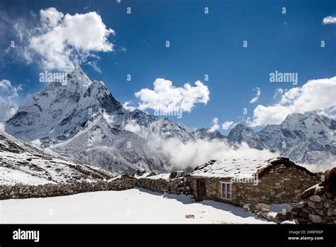 Mountain House In Snow Under Ama Dablam Mountain Peak House In Snowy