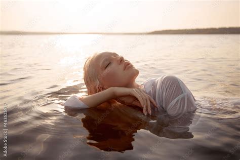 Nude Naked Sexy Woman In Water At Sunset Beautiful Blonde Woman With Short Wet Hair And Big