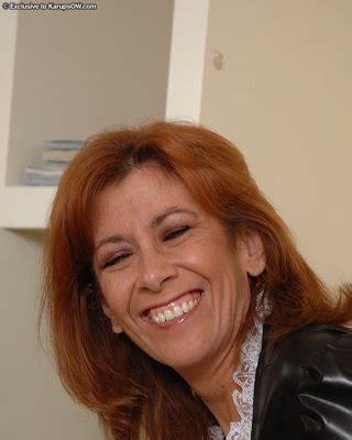 Sassy Mature Maid Taking Off Her Panties And Exposing Her Bushy Gash Porn Pictures XXX Photos