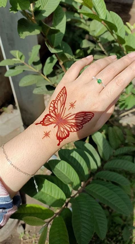 Fluttering Elegance 23 Enchanting Butterfly Henna Designs Large Red