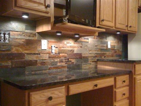 This Natural Slate Tile Backsplash Is Shown With Uba Tuba Granite