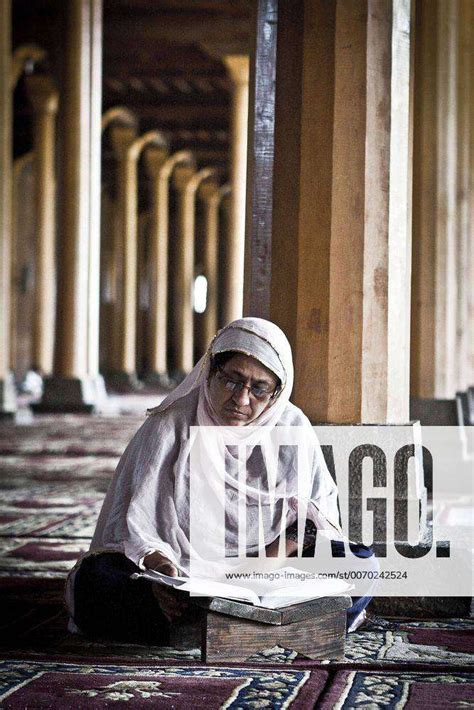 Aug 03 2011 Srinagar Kashmir India Muslim Woman Reading The