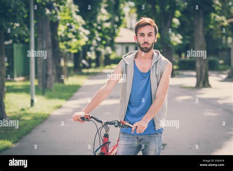 Young hipster gay man bike Banque de photographies et dimages à haute résolution Alamy