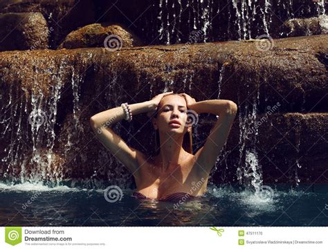Woman In Bikini Relaxing Under Waterfall In Thailand Stock Photo Image Of Relaxing Beach