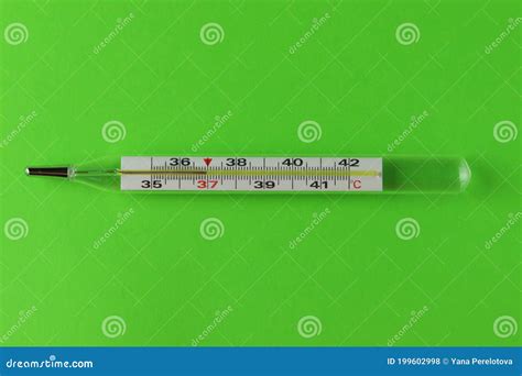 Medical Mercury Thermometer Isolated On Green Stock Photo Image Of