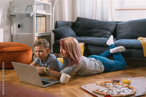 Mother And Son Watching Movie On Laptop At Home Stock Photo Adobe Stock