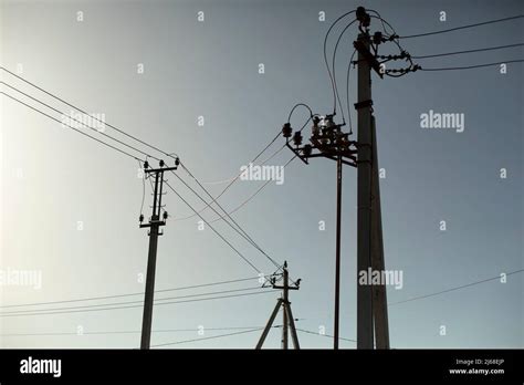 Poles With Electrical Wires Silhouettes Of Communication Racks High