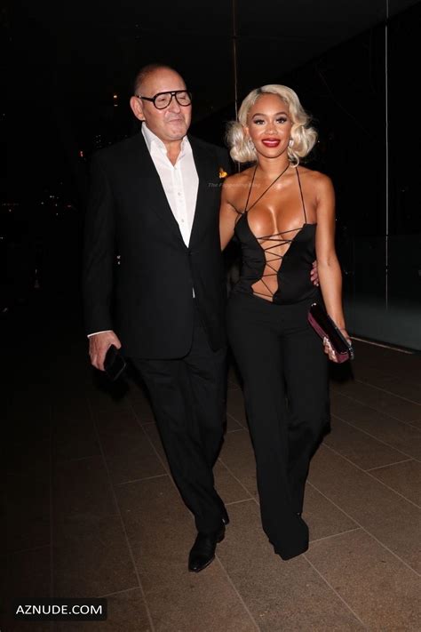 Saweetie Sexy Shows Off Her Hot Boobs In A Lace Up Blouse At The Tom Ford Fashion Show During