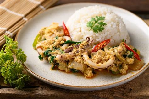 Thai Stir Fried Curry Squid And Cooked Rice Thai Food Stock Photo