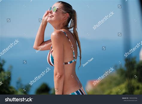 Sexy Beautiful Brunette Woman Sunglasses Bikini Stock Photo