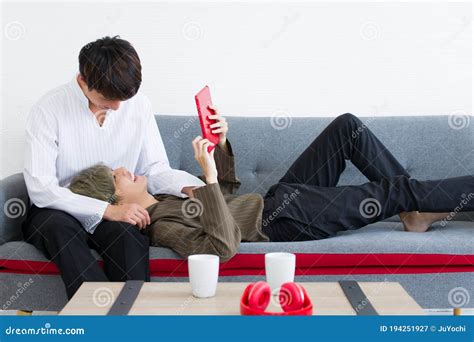 Gay Couples Are Lying On The Sofa Stock Image Image Of Asia Couch 194251927