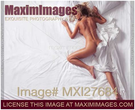 Photo Of Woman Sleeping Naked In Bed On White Sheets View From Above Stock Image MXI27684