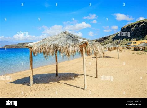 Sable Blanc Sand Beach With Straw Huts And Turquoise Sea Tajourah