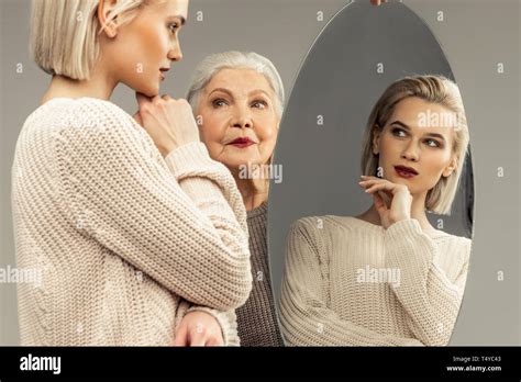 Nice Magnetic Blonde Woman Touching Her Chin Stock Photo Alamy