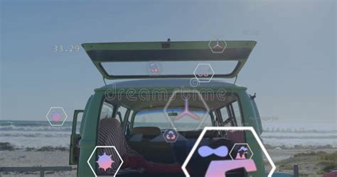 Animation Of Eco Icons Over Open Camper Van On Beach By Sea Stock
