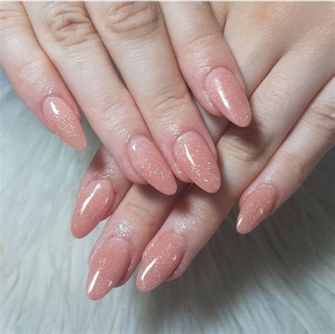 Acrílico nude con brillos Uñas almendradas Manicura de uñas Uña acrilicas