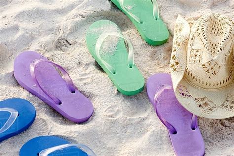 Flip Flops And A Sun Hat On A Beach Stock Photo Dissolve