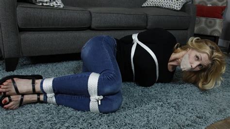 An Intruder Leaves Blonde MILF Tape Gagged And Bound In Her Blue Jeans Tight Sweater And