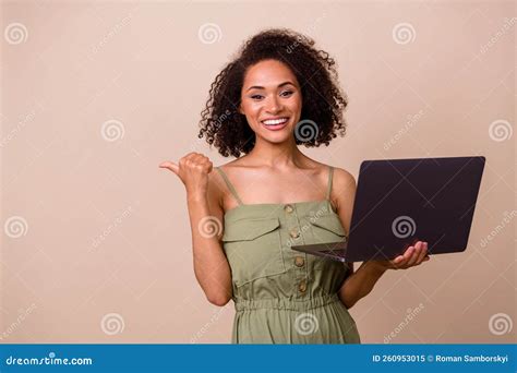 Photo Of Boss Brunette Woman Index Promo Hold Laptop Wear Khaki Overall Isolated On Beige Color