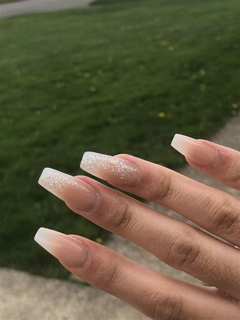 Elegant Ombré Nude Nails with Stunning Accent Designs