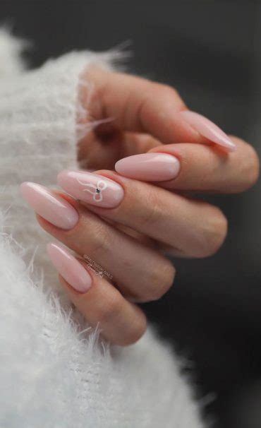 Spring Nail Ideas To Brighten Your Look Nude Pink Nails With Bow