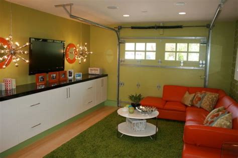 A Living Room Filled With Furniture And A Flat Screen Tv Mounted To The