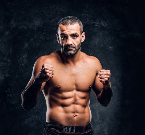 Portrait Of A Brutal Professional Fighter With Naked Torso Posing For A Camera Stock Image