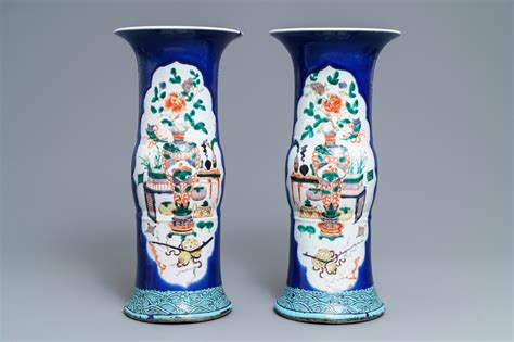 A Pair Of Chinese Famille Verte Powder Blue Ground Gu Vases Kangxi