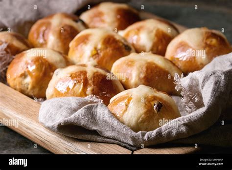 Homemade Easter Traditional Hot Cross Buns On Wooden Tray With Textile Over Old Dark Metal